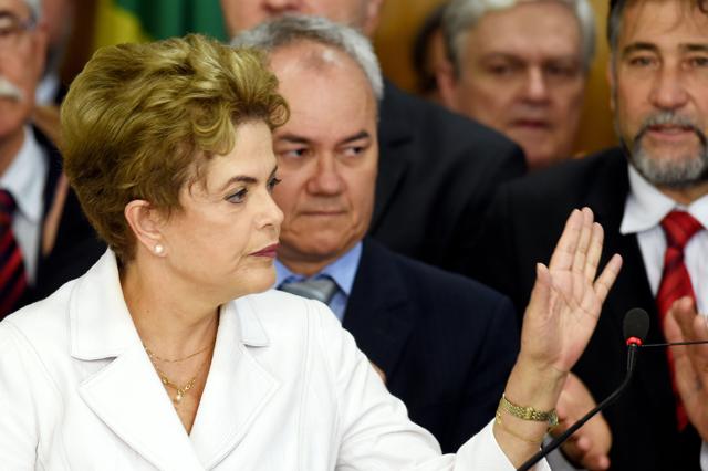 Brazil's suspended President Dilma Rousseff makes a statement at the Planalto Palace in Brasilia.(AFP)