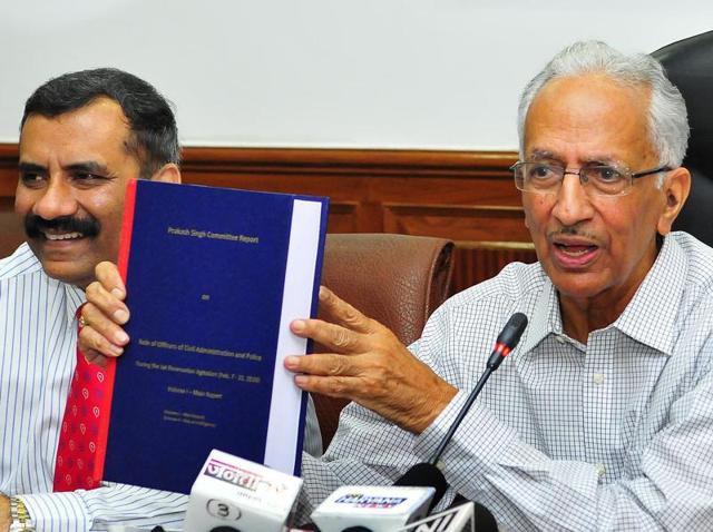 Prakash Singh (right), committee chairman, with his report. He submitted the report to Manohar Lal Khattar at the Haryana secretariat in Chandigarh on Friday.(Keshav Singh/HT Photo) Prakash Singh (right), committee chairman, with his report. He submitted the report to Manohar Lal Khattar at the Haryana secretariat in Chandigarh on Friday.(Keshav Singh/HT Photo)