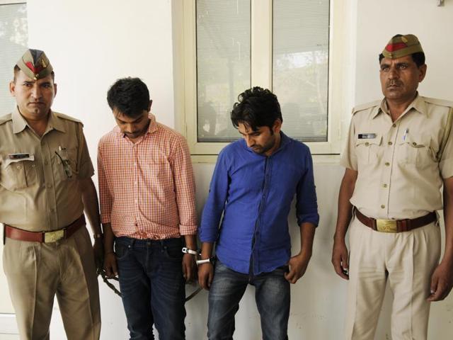 Noida police have arrested two engineering graduates, who were allegedly involved in cheating a person by selling fake insurance.(Burhaan Kinu/HT Photo) Noida police have arrested two engineering graduates, who were allegedly involved in cheating a person by selling fake insurance.(Burhaan Kinu/HT Photo)