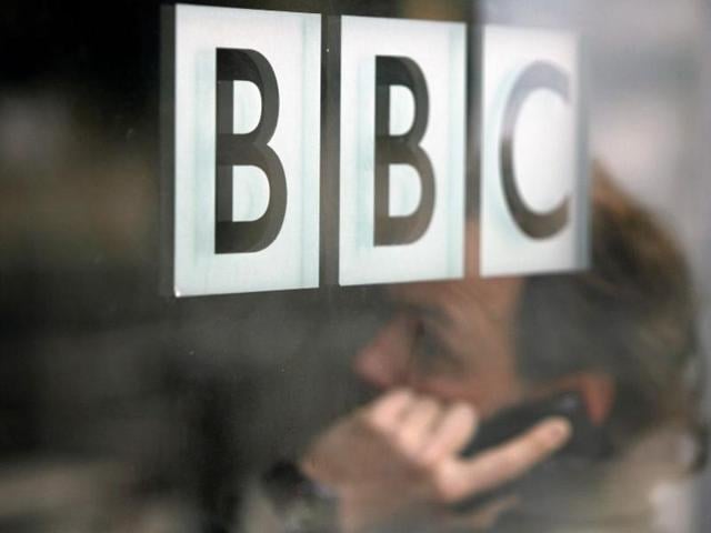A man talks on a mobile phone inside the BBC headquarters in London. (Reuters file photo) A man talks on a mobile phone inside the BBC headquarters in London. (Reuters file photo)