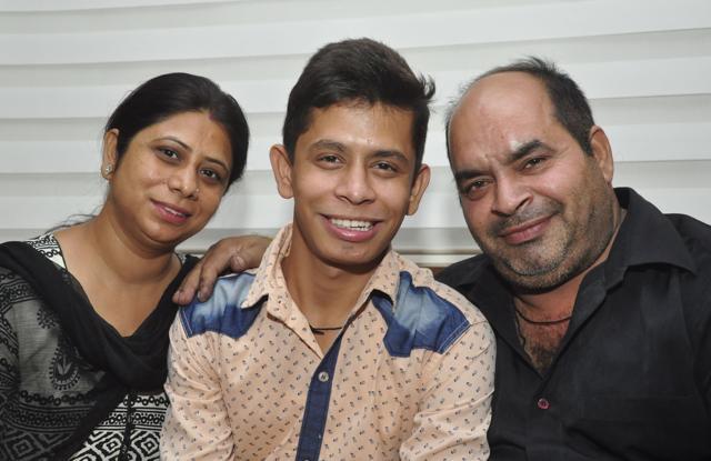Sahil Midda along with his parents in Ludhiana on Friday. (Sikander Singh Chopra/HT Photo)