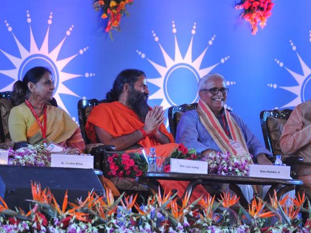 Yoga guru Baba Ramdev, chief minister Shivraj Singh Chouhan, RSS ideologue Suresh Bhaiyyaji Joshi and other dignitaries at international convention 'Living the Right Way' held in village Ninora near Ujjain on Friday. (Shankar Mourya/HT photo) Yoga guru Baba Ramdev, chief minister Shivraj Singh Chouhan, RSS ideologue Suresh Bhaiyyaji Joshi and other dignitaries at international convention 'Living the Right Way' held in village Ninora near Ujjain on Friday. (Shankar Mourya/HT photo)