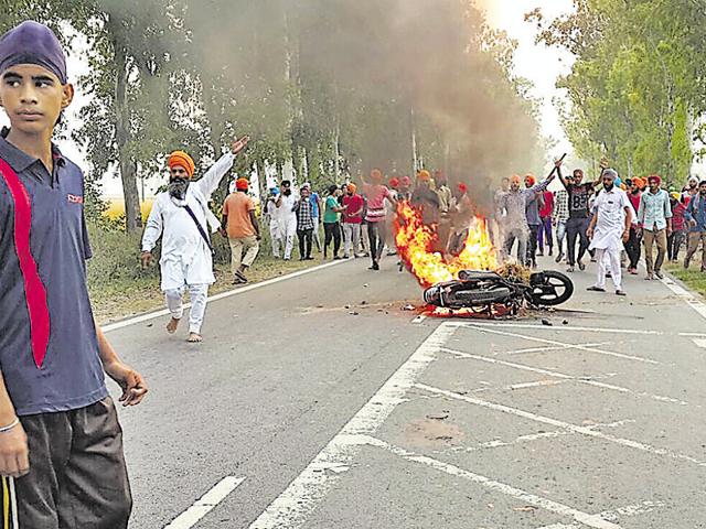 Behbal Kalan village in Faridkot district is where the sacrilege fire started after two Sikhs protesting against the desecration of Guru Granth Sahib died in police firing. (HT File Photo) Behbal Kalan village in Faridkot district is where the sacrilege fire started after two Sikhs protesting against the desecration of Guru Granth Sahib died in police firing. (HT File Photo)