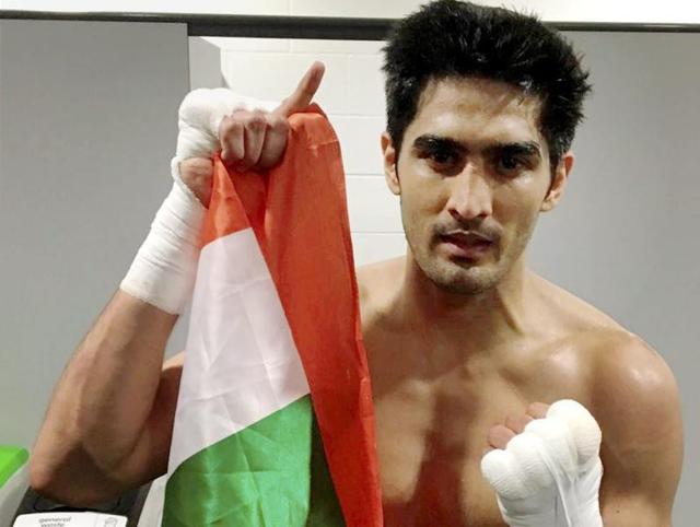 Vijender Singh celebrates after beating French opponent Matiouze Royer at Manchester Arena, England, following his fifth straight win.(PTI file photo) Vijender Singh celebrates after beating French opponent Matiouze Royer at Manchester Arena, England, following his fifth straight win.(PTI file photo)