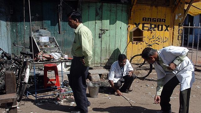 Forensic experts search for clues at the blast site in Malegaon. (AFP file photo) Forensic experts search for clues at the blast site in Malegaon. (AFP file photo)