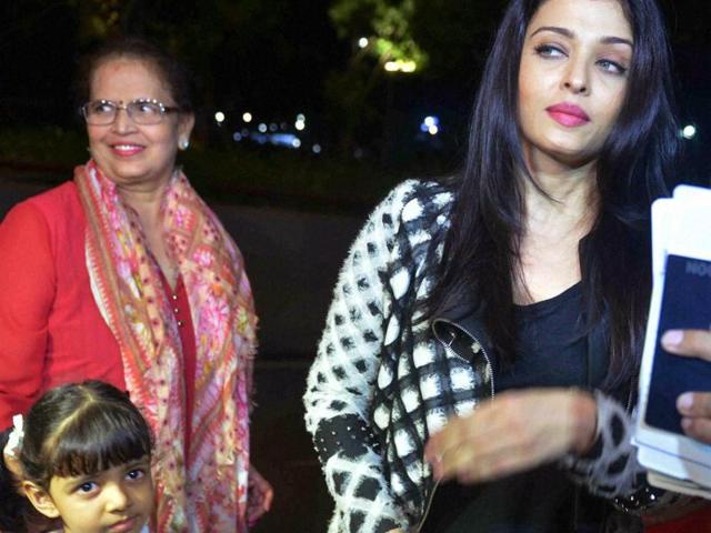 Aishwarya Rai Bachchan with daughter Aaradhya at Mumbai airport before leaving for Cannes Film Festival on Friday. (PTI)