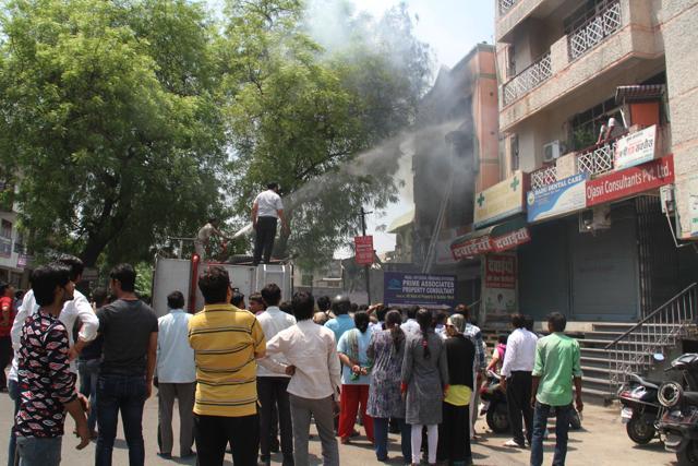 It took four fire tenders and 20 firemen over an hour to douse the flames. Both the first and second floors were gutted, fire officials said. (Sakib Ali/HT) It took four fire tenders and 20 firemen over an hour to douse the flames. Both the first and second floors were gutted, fire officials said. (Sakib Ali/HT)