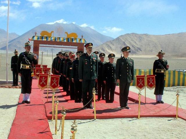 Chinese and Indian soldiers at ceremonial Border Personnel Meetings (BPMs) in Chushul, in Jammu and Kashmir. (PTI File Photo) Chinese and Indian soldiers at ceremonial Border Personnel Meetings (BPMs) in Chushul, in Jammu and Kashmir. (PTI File Photo)