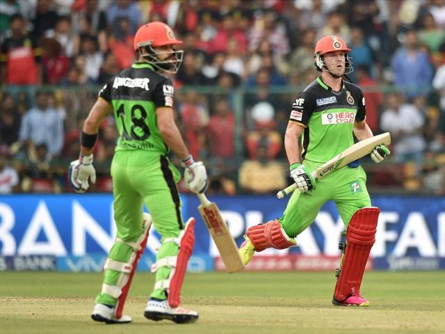 Royal Challengers Bangalore’s Virat Kohli and AB de Villiers put the match firmly beyond Gujarat Lions’ reach on Saturday. (PTI) Royal Challengers Bangalore’s Virat Kohli and AB de Villiers put the match firmly beyond Gujarat Lions’ reach on Saturday. (PTI)