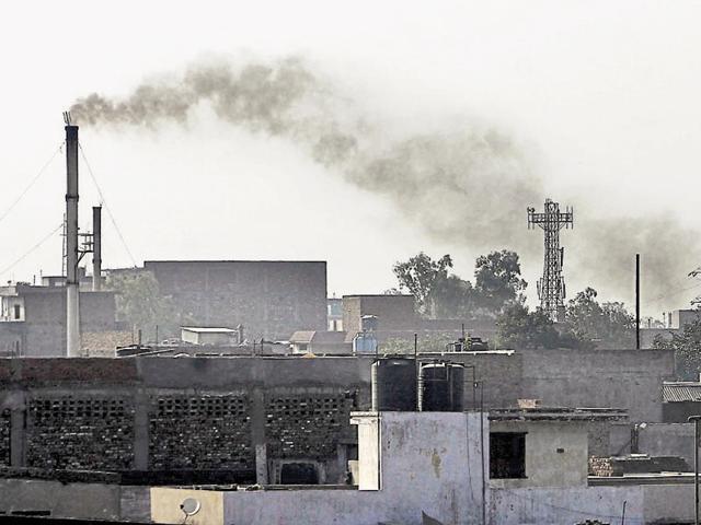 Smoke billows out of a factory at Focal Point in Ludhiana.(HT File Photo)