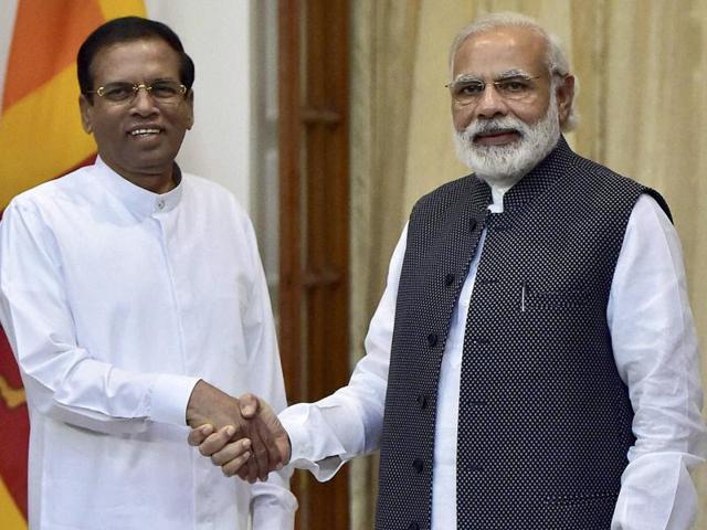 Prime Minister Narendra Modi shakes hands with Sri Lankan President Maithripala Sirisena before their meeting in New Delhi. (PTI) Prime Minister Narendra Modi shakes hands with Sri Lankan President Maithripala Sirisena before their meeting in New Delhi. (PTI)