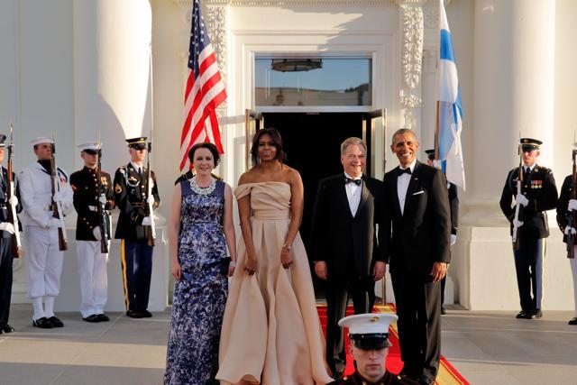 US President Barack Obama and First Lady Michelle Obama welcome Sauli Niinisto (2nd right), President of the Republic of Finland and Mrs Jenni Haukio (left) at a state dinner. (Reuters Photo)