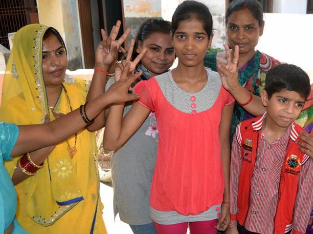 Daughter of a government school teacher, Sakshi Verma of Barabanki’s Maharani Laxmibai Memorial Inter College secured 98.20% to become the state topper.(HT photo)