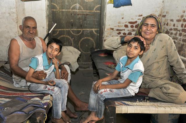 Kapoora Kandola, 84, and Chameli Devi with the twin joys of their life, Manish (left) and Mansi. (Ravi Kumar/HT Photo) Kapoora Kandola, 84, and Chameli Devi with the twin joys of their life, Manish (left) and Mansi. (Ravi Kumar/HT Photo)