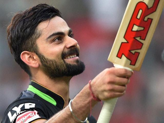 Royal Challengers Bangalore Virat Kohli celebrates his hundred during the IPL match against Gujarat Lions. (PTI Photo) Royal Challengers Bangalore Virat Kohli celebrates his hundred during the IPL match against Gujarat Lions. (PTI Photo)