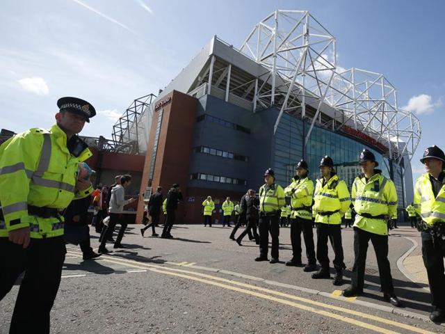 A general view of policemen outside the Old Trafford stadium after the match between Man U and Bournemouth was abandoned. (REUTERS) A general view of policemen outside the Old Trafford stadium after the match between Man U and Bournemouth was abandoned. (REUTERS)