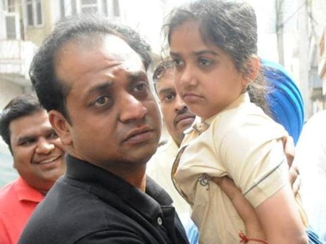 File photo of Shanvi with father Amit Gupta after her release in Patiala. (HT File Photo) File photo of Shanvi with father Amit Gupta after her release in Patiala. (HT File Photo)