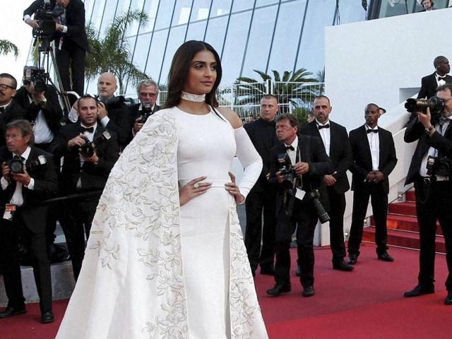 Sonam Kapoor raises the fashion bar in saree-like cutout gown with jacket &  leather gloves | Times of India