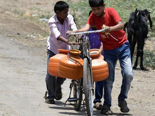 Children fetch water from a borewell in Taka village, Latur. (Kunal Patil/ HT File Photo) Children fetch water from a borewell in Taka village, Latur. (Kunal Patil/ HT File Photo)