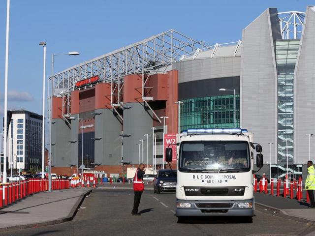Police with sniffer dogs outside the Old Trafford stadium after fans were evacuated and a game between Manchester United and Bournemouth was abandoned when a suspicious package was found in a toilet. (Reuters) Police with sniffer dogs outside the Old Trafford stadium after fans were evacuated and a game between Manchester United and Bournemouth was abandoned when a suspicious package was found in a toilet. (Reuters)