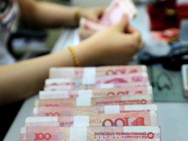 Xu Qin owes more than half its 25,000 investors a total of 5.2 billion yuan ($800 million) said the broadcaster, which is based in the commercial hub. (AFP) Xu Qin owes more than half its 25,000 investors a total of 5.2 billion yuan ($800 million) said the broadcaster, which is based in the commercial hub. (AFP)