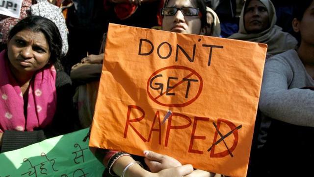 People protesting against crime against women in Delhi (AP/file) People protesting against crime against women in Delhi (AP/file)
