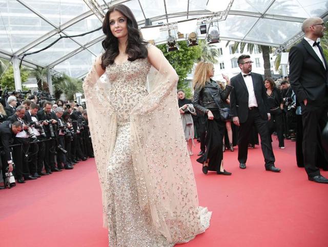 This year, Aishwarya, who opted for bold colours like golden, red and purple, made statement after statement with her long flowing gowns, and high-definition make up.  Marking her 15th year at Cannes, Aishwarya’s first look on the red carpet was a golden Ali Younes Couture gown, which dazzled in golden.  (AP) 