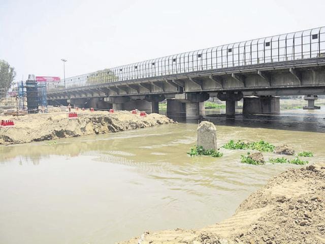 The DMRC has started removing soil the from the bed of river Hindon. This was dumped for construction of pillars for the 9.41km Metro extension project. (Sakib Ali) The DMRC has started removing soil the from the bed of river Hindon. This was dumped for construction of pillars for the 9.41km Metro extension project. (Sakib Ali)