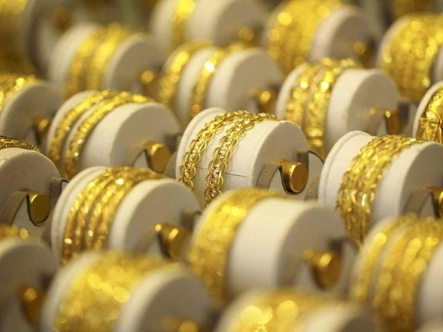 After a three year gap investors have begun flocking back to gold. With global growth concerns remaining and markets still volatile, gold considered a safe-haven asset.(HT Archive) After a three year gap investors have begun flocking back to gold. With global growth concerns remaining and markets still volatile, gold considered a safe-haven asset.(HT Archive)