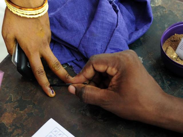 Voters wait to cast their ballots at a polling station in Chennai. (AFP Photo) Voters wait to cast their ballots at a polling station in Chennai. (AFP Photo)