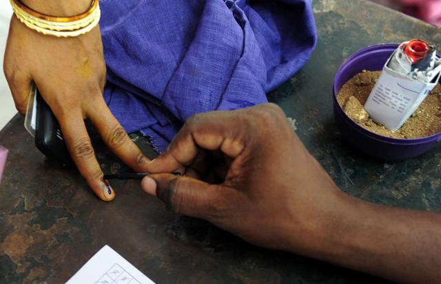 Voter queue as they wait to cast their ballots at a polling station in Chennai. (AFP) Voter queue as they wait to cast their ballots at a polling station in Chennai. (AFP)