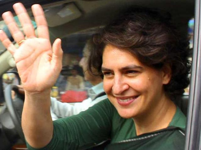 Priyanka Gandhi Vadra meets villagers during an election campaign in Amethi.(HT File Photo)