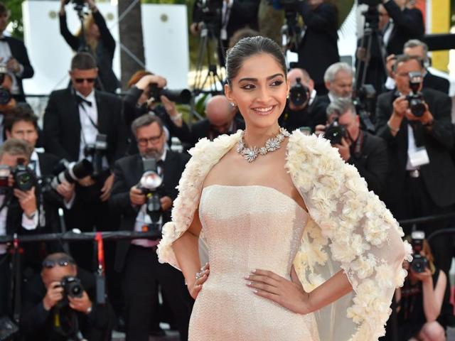 Sonam paired the Ralph and Russo gown with light pink blushes, eyeshadow and lips for the red carpet. Her hair was tied in a neat little bun. (AFP) Sonam paired the Ralph and Russo gown with light pink blushes, eyeshadow and lips for the red carpet. Her hair was tied in a neat little bun. (AFP)