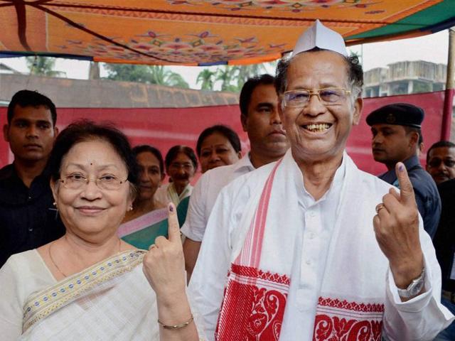 Assam chief minister Tarun Gogoi with his wife Dolly Gogoi, after voting in the first phase of Assam assembly election, at Jorhat district of Assam. (PTI Photo)