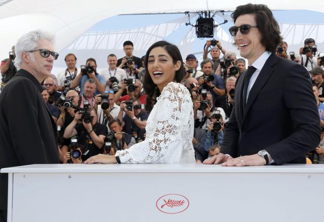Director Jim Jarmusch, cast members Golshifteh Farahani and Adam Driver (L-R) pose during a photocall for the film Paterson in competition at the 69th Cannes Film Festival in Cannes. (REUTERS)