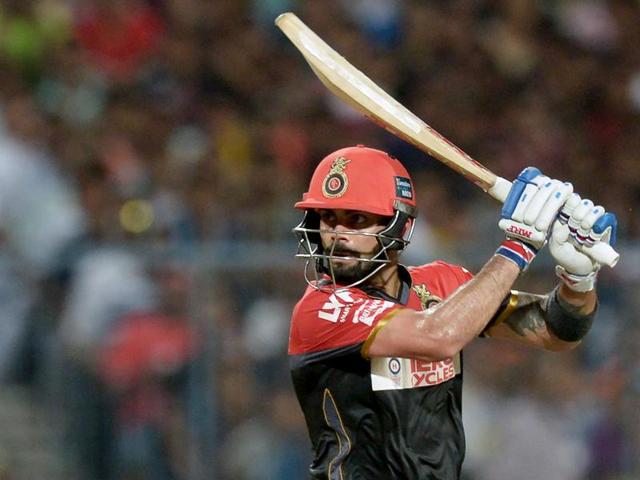 Despite splitting the webbing on his left hand, Virat Kohli hit a match-winning 75 to keep Royal Challengers Bangalore’s playoff hopes alive. (AFP) Despite splitting the webbing on his left hand, Virat Kohli hit a match-winning 75 to keep Royal Challengers Bangalore’s playoff hopes alive. (AFP)