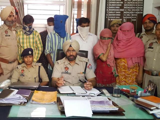 The accused in police custody in Jalandhar on Monday.(HT Photo)