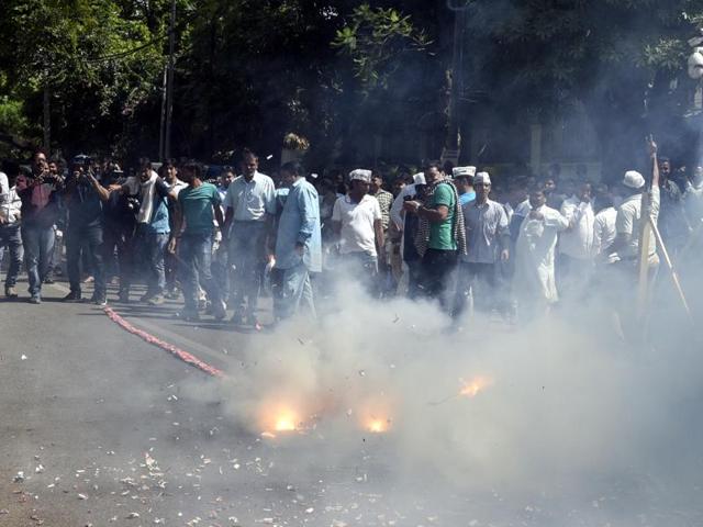 Aam Aadmi Party workers light firecrackers to celebrate the party’s performance in the municipal bypolls on Tuesday. (Sonu Mehta/HT Photo) Aam Aadmi Party workers light firecrackers to celebrate the party’s performance in the municipal bypolls on Tuesday. (Sonu Mehta/HT Photo)