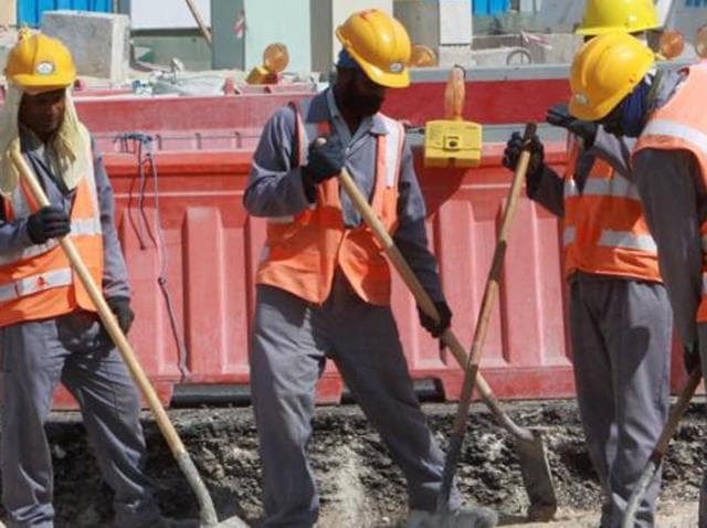 A file photo of workers at a construction site in Doha. (AFP Photo) A file photo of workers at a construction site in Doha. (AFP Photo)