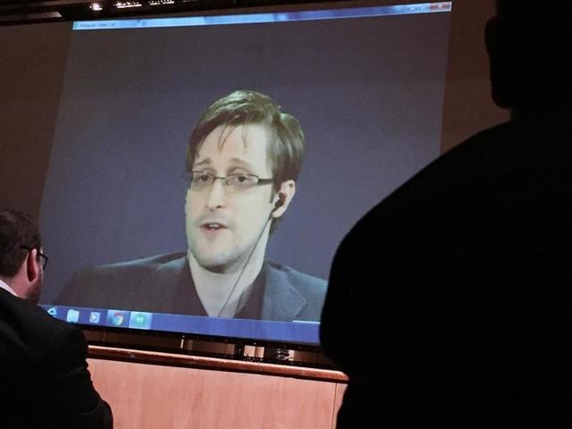 Former National Security Agency contractor Edward Snowden speaks via video conference to people in the Johns Hopkins University auditorium in Baltimore.(AP file photo) Former National Security Agency contractor Edward Snowden speaks via video conference to people in the Johns Hopkins University auditorium in Baltimore.(AP file photo)