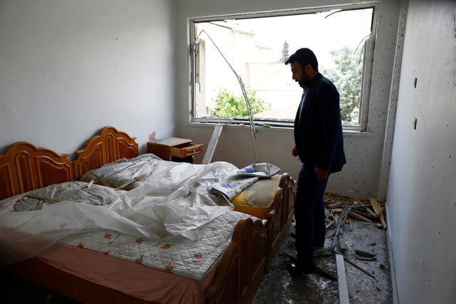 Omer Ciloglu stands inside his devastated house. (REUTERS) Omer Ciloglu stands inside his devastated house. (REUTERS)