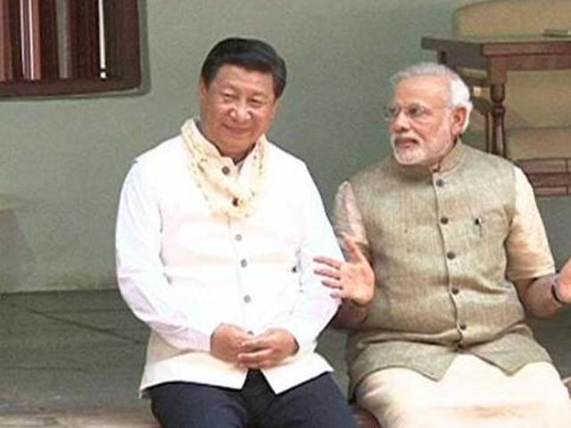 China's President Xi Jinping and Indian Prime Minister Narendra Modi share a quiet moment at the Sabarmati Ashram in Ahmedabad. (AFP File Photo) China's President Xi Jinping and Indian Prime Minister Narendra Modi share a quiet moment at the Sabarmati Ashram in Ahmedabad. (AFP File Photo)