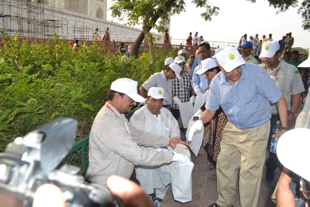 Members of Paryatan Mitra, a voluntary organisation, clean the Taj Mahal’s premises on Monday. (Raju Tomar/ HT Photo) Members of Paryatan Mitra, a voluntary organisation, clean the Taj Mahal’s premises on Monday. (Raju Tomar/ HT Photo)