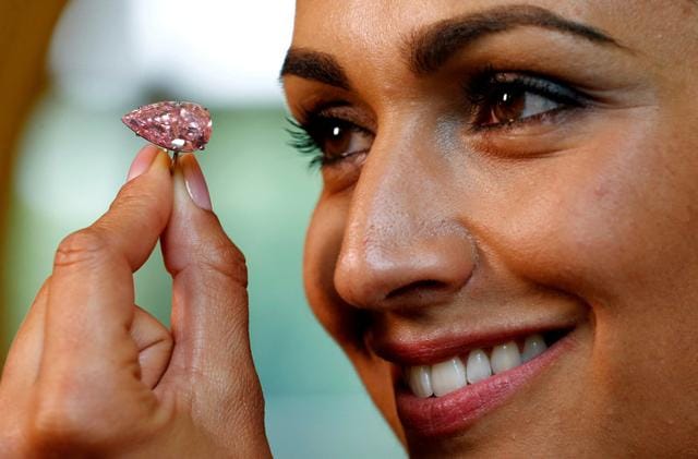 The “Unique Pink”, weighing 15.38 carats and mounted on a ring, sold to an Asian private collector bidding by telephone, Sotheby’s said. (REUTERS) The “Unique Pink”, weighing 15.38 carats and mounted on a ring, sold to an Asian private collector bidding by telephone, Sotheby’s said. (REUTERS)