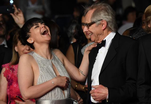 British actor Hayley Squires (L) and British director Ken Loach laugh on May 13, 2016 as they arrive for the screening of the film I, Daniel Blake at the 69th Cannes Film Festival in Cannes. (AFP) British actor Hayley Squires (L) and British director Ken Loach laugh on May 13, 2016 as they arrive for the screening of the film I, Daniel Blake at the 69th Cannes Film Festival in Cannes. (AFP)