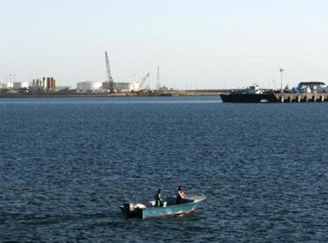 In this file photo, a speed boat passes by oil docks at the port of Kalantari in the city of Chabahar, east of the Strait of Hormuz.(Reuters) In this file photo, a speed boat passes by oil docks at the port of Kalantari in the city of Chabahar, east of the Strait of Hormuz.(Reuters)