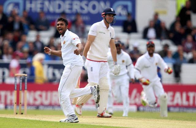 Dasun Shanaka celebrates taking the wicket of Alastair Cook. (AP) Dasun Shanaka celebrates taking the wicket of Alastair Cook. (AP)