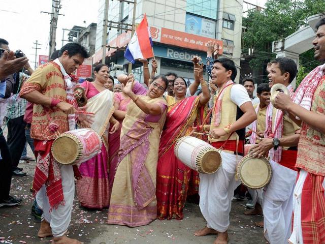 AGP party workers celebrating their victory in Assam Assembly polls in Guwahati . (PTI)