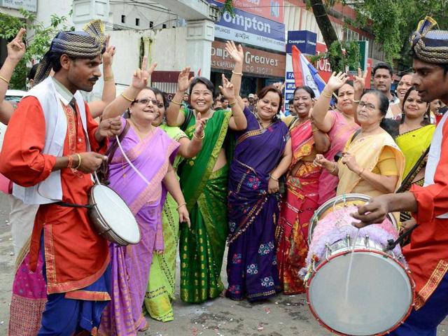 AGP party workers celebrating their victory in Assam Assembly polls in Guwahati on Thursday. (PTI)