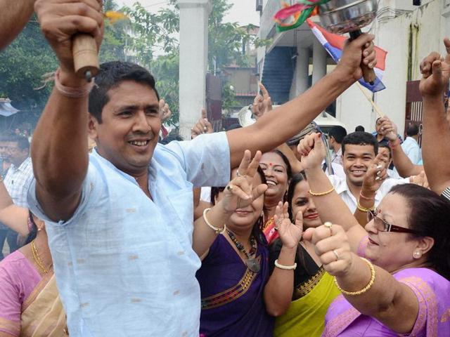 AGP party workers celebrating their victory in Assam Assembly polls in Guwahati on Thursday. (PTI)